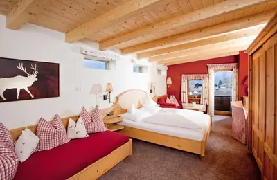 Ein Bett oder Betten in einem Zimmer der Unterkunft Kirchenwirt