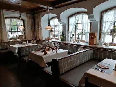 Ein Bett oder Betten in einem Zimmer der Unterkunft Kirchenwirt
