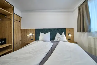 Ein Bett oder Betten in einem Zimmer der Unterkunft Appartement Schönfeld