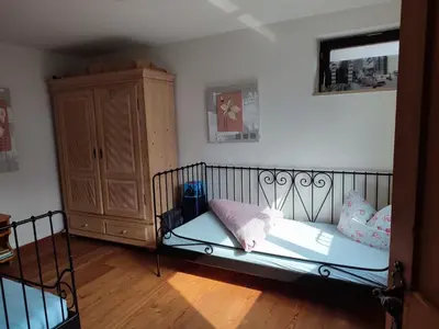 Ein Bett oder Betten in einem Zimmer der Unterkunft Ferienhaus Sonnleiten