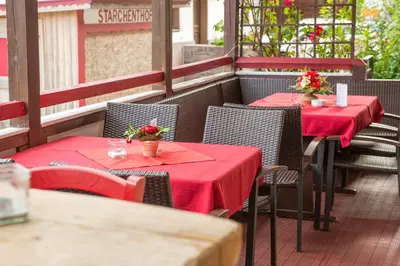 Ein Restaurant oder anderes Speiselokal in der Unterkunft Ferienwohnungen Starchenthof - Wildschönau, Premiumcard inclusive