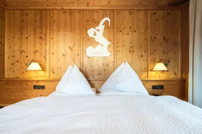 Ein Bett oder Betten in einem Zimmer der Unterkunft Gästehaus Stotter