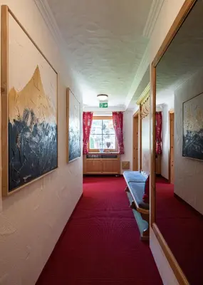 Ein Bett oder Betten in einem Zimmer der Unterkunft Gästehaus Stotter