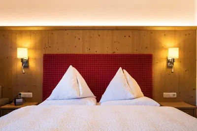 Ein Bett oder Betten in einem Zimmer der Unterkunft Gästehaus Stotter