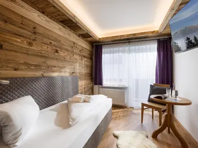 Ein Bett oder Betten in einem Zimmer der Unterkunft Tennenwirt Guesthouse - Adults only
