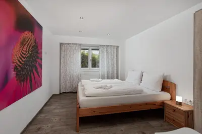 Ein Bett oder Betten in einem Zimmer der Unterkunft Alpine View Apartments