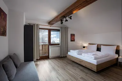 Ein Bett oder Betten in einem Zimmer der Unterkunft Alpine View Apartments