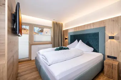 Ein Bett oder Betten in einem Zimmer der Unterkunft Apartments Dorfbäck
