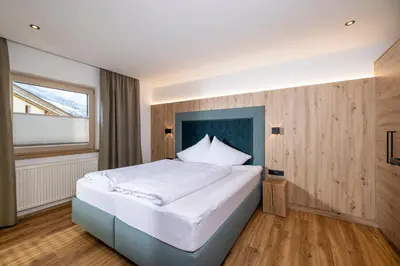 Ein Bett oder Betten in einem Zimmer der Unterkunft Apartments Dorfbäck