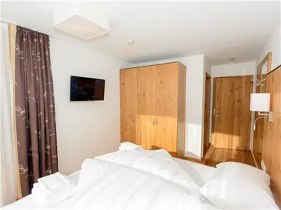 Ein Bett oder Betten in einem Zimmer der Unterkunft Penthouse am Sonnenhang