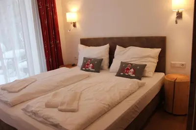 Ein Bett oder Betten in einem Zimmer der Unterkunft Penthouse am Sonnenhang