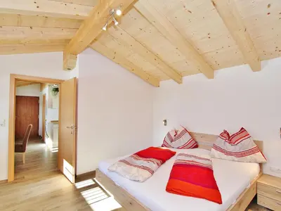 Ein Bett oder Betten in einem Zimmer der Unterkunft Apartment in Hollersbach near Ski Lift