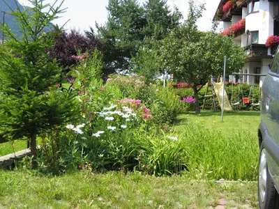 Ein Garten an der Unterkunft das Luggi Appartements