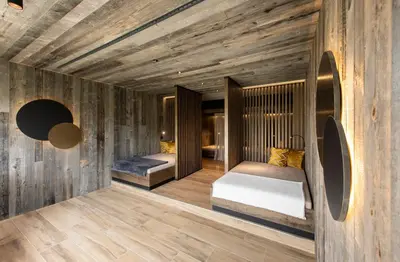Ein Bett oder Betten in einem Zimmer der Unterkunft Hotel Königsleiten Vital Alpin