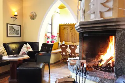 Ein Sitzbereich in der Unterkunft Hotel Unterbrunn Apartments & Gästehaus