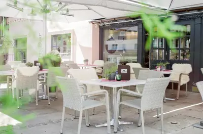 Ein Restaurant oder anderes Speiselokal in der Unterkunft Hotel Unterbrunn Apartments & Gästehaus