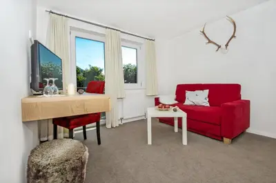 Ein Sitzbereich in der Unterkunft Hotel Unterbrunn Apartments & Gästehaus