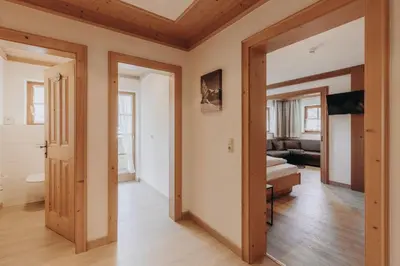 Ein Bett oder Betten in einem Zimmer der Unterkunft Habachklause Familien Bauernhof Resort