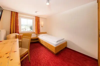 Ein Bett oder Betten in einem Zimmer der Unterkunft Hotel Bräurup