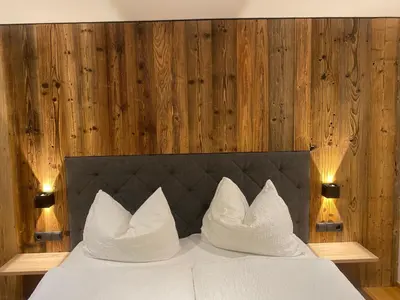 Ein Bett oder Betten in einem Zimmer der Unterkunft Ferienhaus Edith