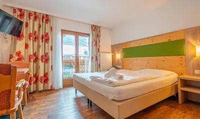 Ein Bett oder Betten in einem Zimmer der Unterkunft Hotel Wechselberger by Alpeffect Hotels