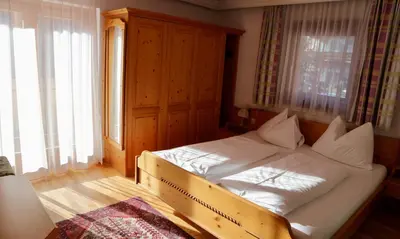 Ein Bett oder Betten in einem Zimmer der Unterkunft Hotel Wechselberger by Alpeffect Hotels