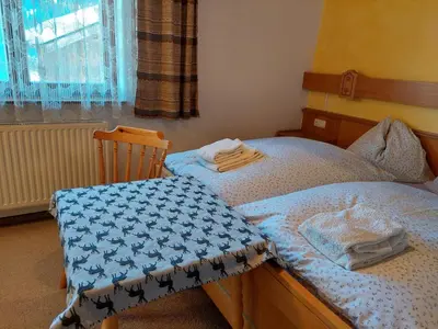 Ein Bett oder Betten in einem Zimmer der Unterkunft Ferienwohnung Muhlbauer