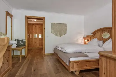 Ein Bett oder Betten in einem Zimmer der Unterkunft Alpin Juwel - Bio und Lifestylehotel