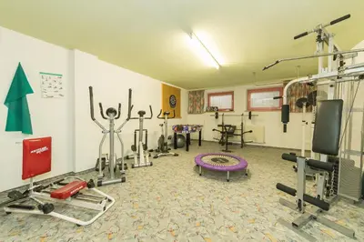 Das Fitnesscenter und/oder die Fitnesseinrichtungen in der Unterkunft Ferienwohnung Simair