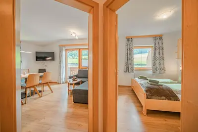 Ein Bett oder Betten in einem Zimmer der Unterkunft Appartements Gamper - Alpline Appartements KG