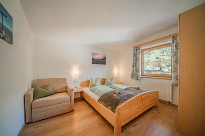 Ein Bett oder Betten in einem Zimmer der Unterkunft Appartements Gamper - Alpline Appartements KG