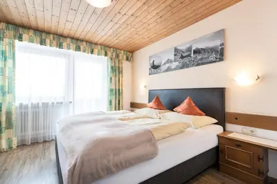 Ein Bett oder Betten in einem Zimmer der Unterkunft Gasthof Pension Berghof