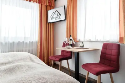 Ein Bett oder Betten in einem Zimmer der Unterkunft Gasthof Pension Berghof