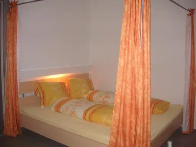 Ein Bett oder Betten in einem Zimmer der Unterkunft Ferienwohnung Pali