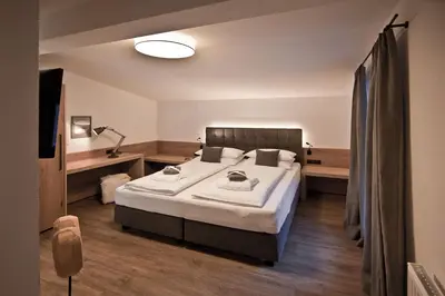 Ein Bett oder Betten in einem Zimmer der Unterkunft Villa Michaela