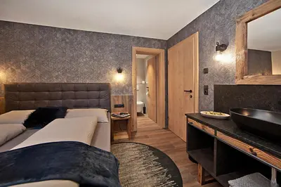 Ein Bett oder Betten in einem Zimmer der Unterkunft Villa Michaela