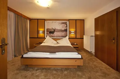 Ein Bett oder Betten in einem Zimmer der Unterkunft Villa Michaela