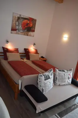 Ein Bett oder Betten in einem Zimmer der Unterkunft Flatscher‘s