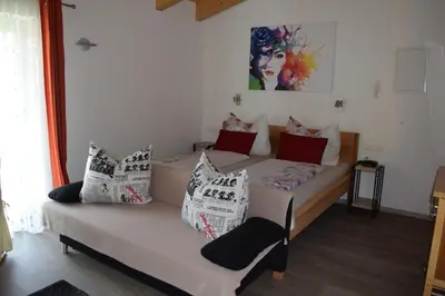 Ein Bett oder Betten in einem Zimmer der Unterkunft Flatscher‘s