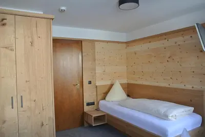 Ein Bett oder Betten in einem Zimmer der Unterkunft Pension Waidmannsruh
