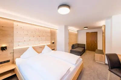Ein Bett oder Betten in einem Zimmer der Unterkunft Pension Waidmannsruh
