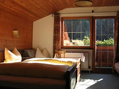 Ein Bett oder Betten in einem Zimmer der Unterkunft Pension Waidmannsruh