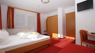 Ein Bett oder Betten in einem Zimmer der Unterkunft Chalet Lena