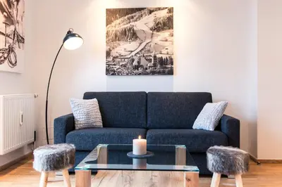 Ein Sitzbereich in der Unterkunft Appartement Central