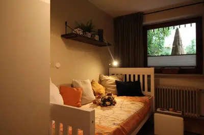 Ein Bett oder Betten in einem Zimmer der Unterkunft Apartment Franz-Walde-Weg by Apartment Managers