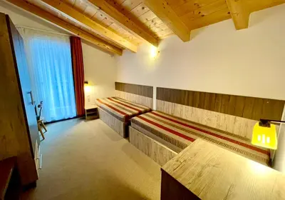 Ein Bett oder Betten in einem Zimmer der Unterkunft Hotel Alta Vista