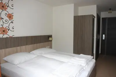 Ein Bett oder Betten in einem Zimmer der Unterkunft Hotel Alta Vista