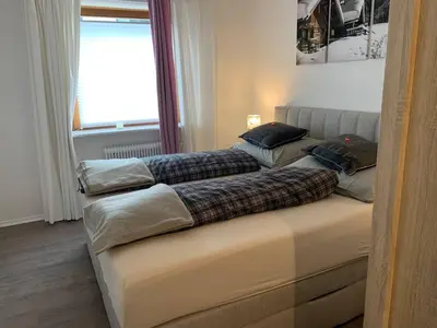 Ein Bett oder Betten in einem Zimmer der Unterkunft Hornhaus