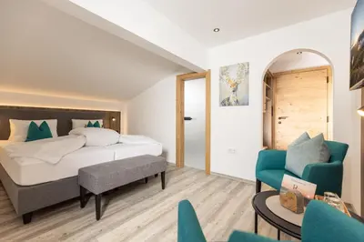 Ein Bett oder Betten in einem Zimmer der Unterkunft Pension Rofan