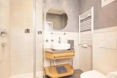 Ein Badezimmer in der Unterkunft Pension Rofan